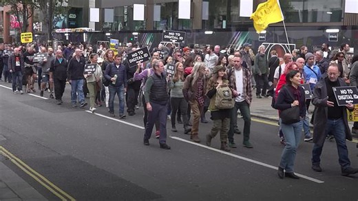 Thousands march against digital ID plans