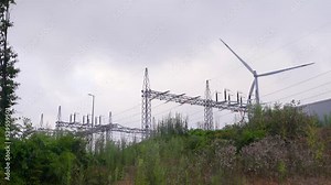 Switchyard and wind turbines. Power generation plant.