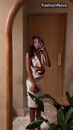 Kea on Instagram: "🧡 @FashionNova Down The Shore Cuffed Denim Shorts Raya Tie Dye Satin Halter Top"