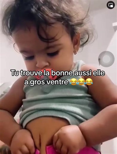 Playful Toddler Shows Off Belly Button Piercing