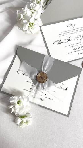 Gray on white. So elegant. Our invitations are more than just paper, they are a sensory journey. But what truly sets our invitations apart is the texture of the paper itself. Laid Gray for the background and Cream textired paper for invite sheet. Run your fingers across it, and you"ll feel the fine, textured surface that adds a unique depth to your wedding announcement. It's a touch of luxury that your guest will remember. | Thiệp cưới Gấu