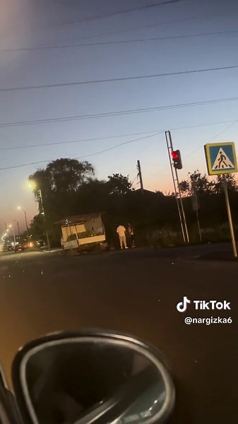 Twilight Urban Journey: Capturing Moving Scenes