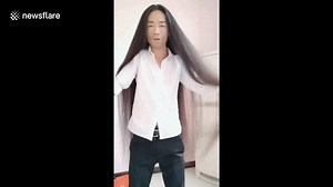 1.5K views | 210 Chinese man uses own hair as 'rope swing' A bizarre from shows a man hanging by his 1.3-metre-long hair and using it to swing from a tree. In the , the man hangs himself from the tree by tying his long hair around it, oscillating back and forth. The clip was filmed in Changyuan County in central Henan Province on September 20. | What Is This? | Facebook