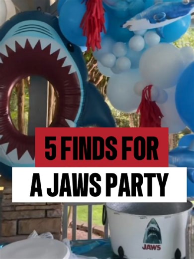 This JAWS party came together so easily with these Amazon finds. The inflatable great white, shark sprinkler, tablecloths, party favor bags and of course the shark costume I made my husband wear - everything held up perfectly for a summer pool party. #JAWS #kidspartyideas #kidsparty