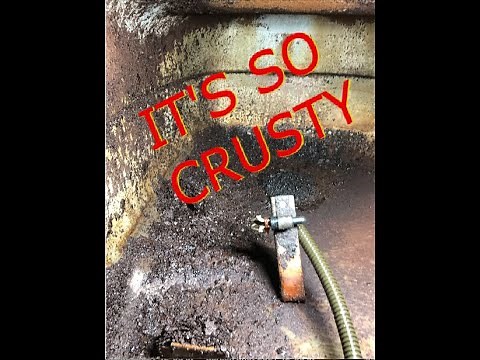 Remove and clean the hardbody fuel tank