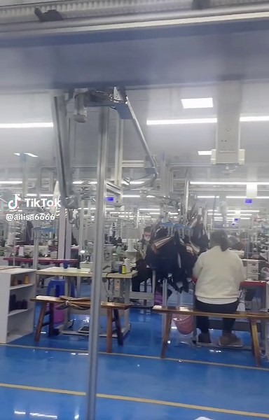 Today I visited a yoga apparel factory and took some photos. I loved the clattering sound of the sewing machines; it sounded like cheerful music. I'm not just an investor and trader, but also a fashion designer.