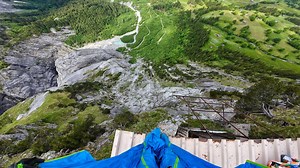 Man climbs an abandoned tower - then jumps into open air