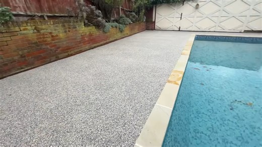What this stone pool surround upgrade really looks like