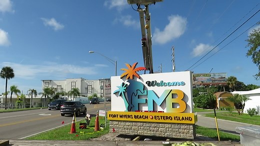 102K views · 854 reactions | Workers from Lee Design install the new welcoming sign with the new Town of Fort Myers Beach logo at the foot of the Matanzas Pass Bridge on the town's right-of-way this morning: | Fort Myers Beach Bulletin | Fort Myers Beach Observer | Facebook