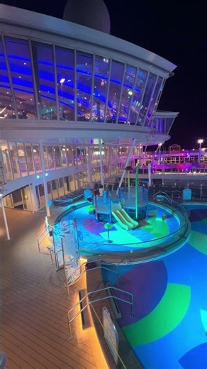 This is what a cruise ship water park looks like after dark #harmonyoftheseas #cruisetips #travel