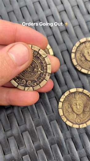 3.4K views · 82 reactions |  Orders getting done & ready to ship! Each Aztec coin deep-engraved in solid brass, finished by hand, and packed with care. Thank you all for the support — these relics are heading out to their new homes ⚡️ #EDCCoin #LaserEngraving #AztecCoin #EverydayCarry #BrassArt #LimitlessEngraver #PocketRelic #CustomEngraving #EDCCommunity | Tamas Molnar | Facebook