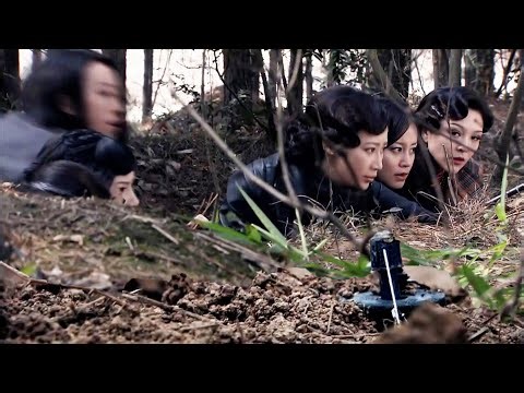 A female special forces team ambushes the Japanese on a key route, successfully rescuing teammates.