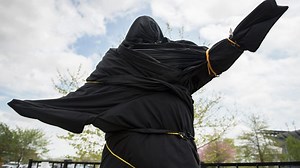 A Flyers fan reacts to the covering of the Kate Smith statue after 'offensive lyrics' come to light