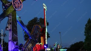 Nighttime Fun Fair Ride in Motion