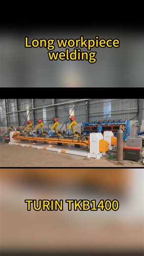 Turin TKB1400 team is welding a long workpiece together with a positioner