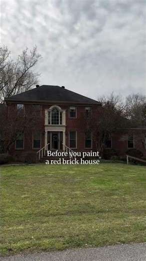 Painted the trim Black Fox by SW, left the brick alone