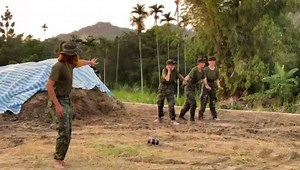 Outdoor Explosive Activity in Camouflage Uniforms