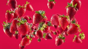 clip-1053531500-flying-strawberry-fuchsia-background