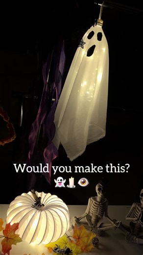 An empty water bottle with a spooky little glow-up! 👻✨ Add string lights, fabric, and a ghostly face, and you’ve got a cute hanging Halloween decoration. Would you hang this little ghost in your home? 🎃 #HalloweenDIY #DIYGhost #HalloweenDecor #SpookyCrafts #EasyDIY