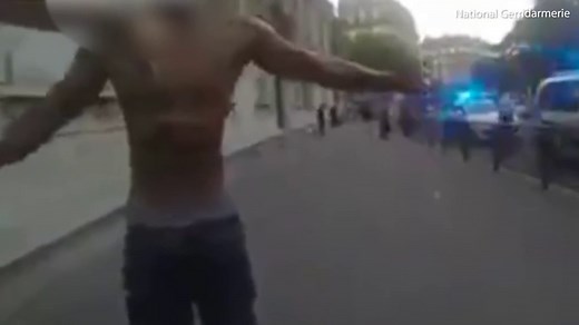 Shocking moment a man bursts into FLAMES after police taser him