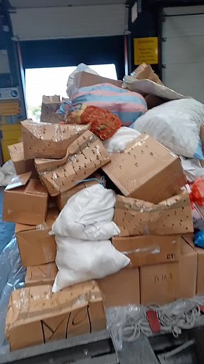 Exploring Cardboard Box Stacks in a Warehouse Setting