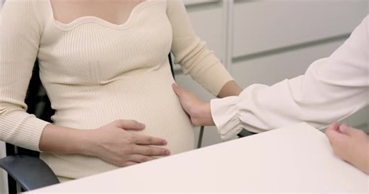 Pregnant Woman Having a Doctor's Visit in Office