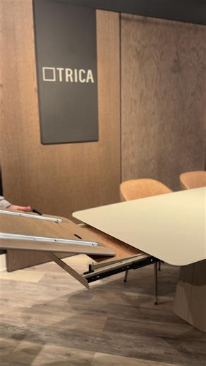 Effortlessly make room for everyone, whether it’s game night or dinner, with this sleek self-storing extension table from Trica. More space. More style. Only at HOUSEWORKS. | IndyHouseworks