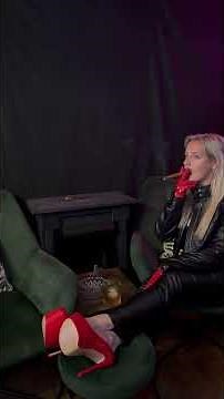Leather blonde cigar smoking in leather gloves and massive heels. #smokingfetish #leatherfetish