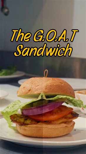 Pita Jungle on Instagram: "The G.O.A.T. Chicken Sandwich. Grilled, marinated all-natural chicken, 1001 dressing, tomatoes, pickles, red onion, seasonal lettuce - all on a buttery brioche bun."