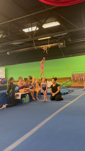 1.2M views · 11K reactions | #joeytotheworld competes vault! She has been watching hand stand flat backs but her vault is a straight jump stick. #downsyndrome #aau #gymnastics #hugs #tinygymnast #gymnast | Suzanne Alvey Williams | Facebook
