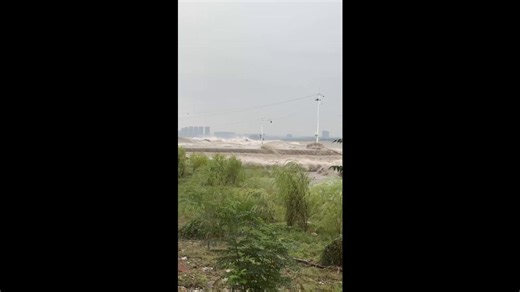Tidal bore rolls along river in China