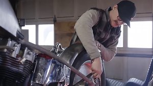 This video is brought to you by: http://www.lowbrowcustoms.com & https://www.youtube.com/gearedscience In this installment of Ian Olsen's Harley-Davidson 1981 Shovelhead build, Ian shows you how easy it is to mount a Lowbrow Customs Manta Ray Fender some of our Coped Bungs. With a few quick steps, measuring twice, drilling once and using all the right tools; Ian walks you through how easy it is to get those bungs welded up and your fancy new fender mounted up properly onto your frame. This metho