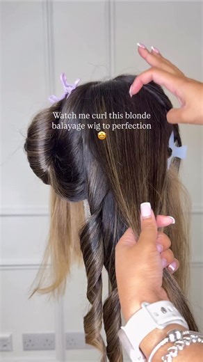Premium Wigs on Instagram: "Watch me curl this blonde balayage wig to perfection 🤩 Caption Showing off my effortless curling technique on this handmade balayage wig until the right audience finds me 🤩 Discover the ultimate luxury in ready-to-ship wigs, crafted with premium human hair for a flawless, natural look. ‌ Our high-end HD lace wigs melt seamlessly for an undetectable finish, providing the perfect blend of elegance and sophistication. ‌ Designed for modern, confident wome