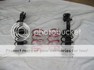 a HOW To replace Front Strut Coil Spring