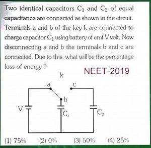 Two identical capacitors C1​ and C2​ of equal capacitance are c... | Filo