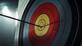 Slow Motion of an Arrow Hitting a Target. Close Up on an Arrow...