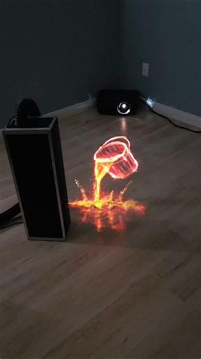 AI Art Paint Bucket Projected Onto A Fog Machine