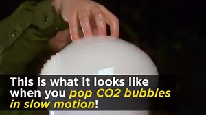 This is what it looks like when you pop CO2 bubbles in slow motion! | Science Channel