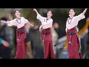 Beautiful Tibetan woman perform a so wonderful Tibetan dance