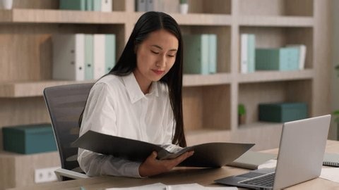 clip-4015450653-asian-japanese-woman-office-worker-talking-online