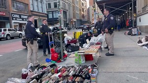 NYPD confiscating Canal St goods