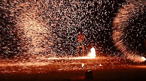 clip-1103866523-fire-dancing-show-impressive-performance-by-group