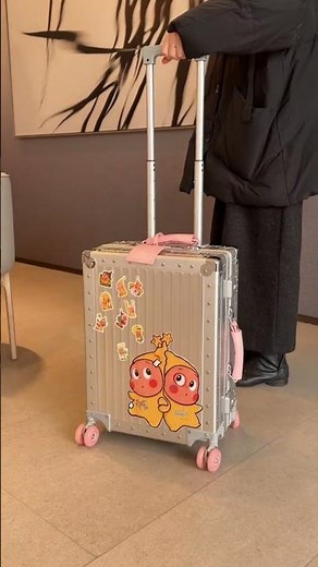 This pink aluminum suitcase is seriously trending right now 💗🔥