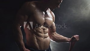 Athlete stretching resistance band. Training with rubber band. The concept of strength training and health Stock Video