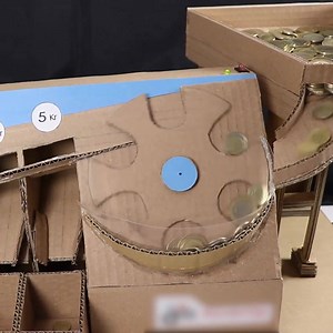 7.7M views · 12 reactions | Keep your coins neatly organized with this DIY cardboard coin sorting machine. | Well Done Stuff | Facebook