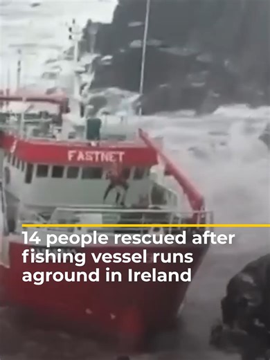 Video shows the moment a Coast Guard helicopter rescued 14 people from a fishing vessel after it ran aground in Dingle Bay, Ireland. #news