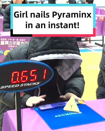 1M views · 2.1K reactions | A girl nailed a Pyraminx in an instant during a competition, breaking the record and amazing everyone. | Discover China | Facebook