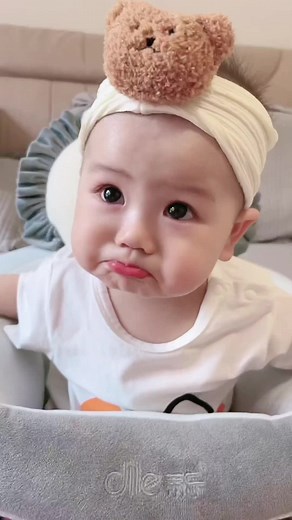 Adorable Child in Cute Teddy Bear Headband