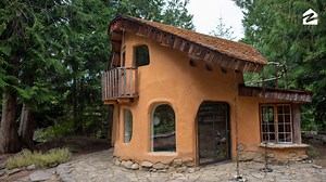 This woodsy little cottage was sculpted from clay, sand and straw. And the inside is about as cozy as it gets. | Zillow