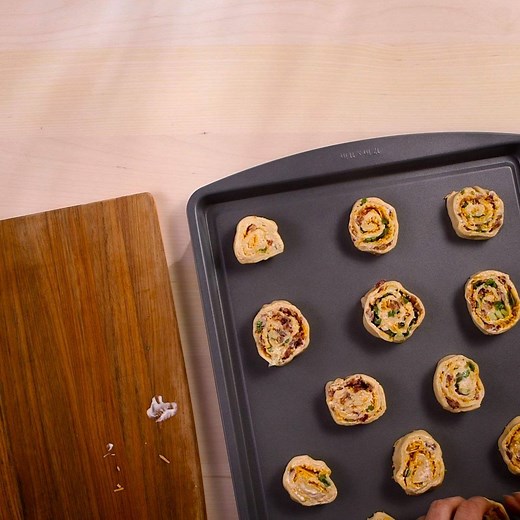 47K views · 976 reactions | Hosting the New Year's Eve party? Serve these with a side of ranch for the perfect end to 2017. Bacon-Cheddar Pinwheels recipe: https://www.pillsbury.com/recipes/bacon-cheddar-pinwheels/075a1c9c-b343-431f-a12b-d5d98c2a4001?utm_medium=social&utm_source=facebook&utm_campaign=12_2017_standard?mktimp=PBRBGCRESCNT | Pillsbury | Facebook